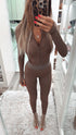 Belted jumpsuit with v shape.
