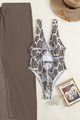 Snakeskin swimsuit with mesh cover